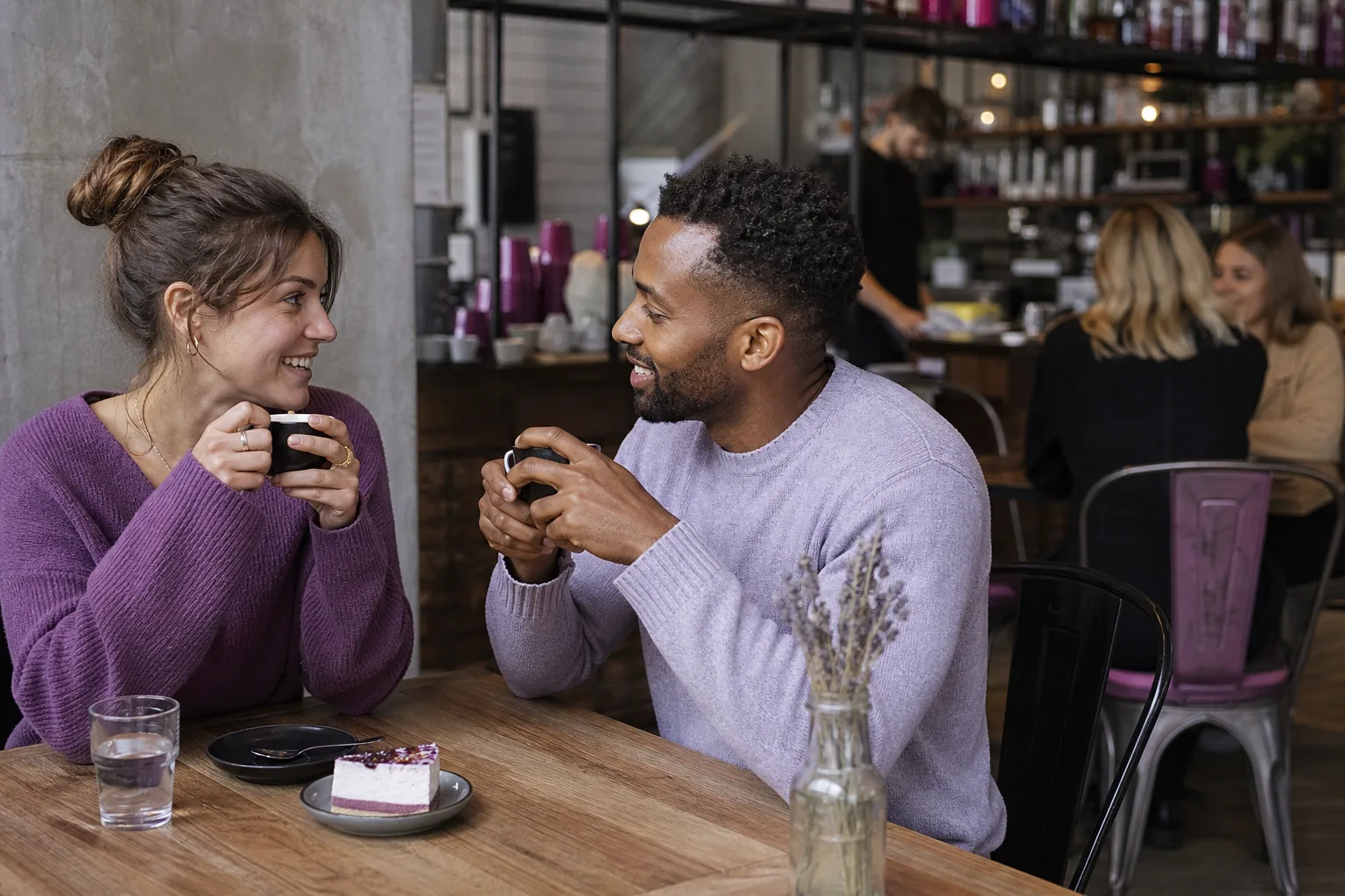 Two people talking over coffee near Southampton city centre