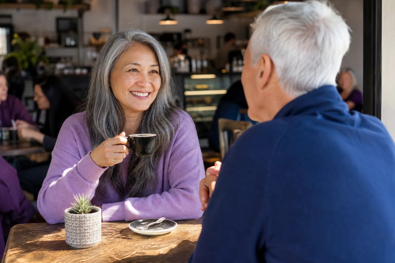Mature couple talking over coffee in Southampton